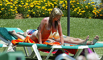 Brooke Kinsella sunbathing topless in Puerto Banus