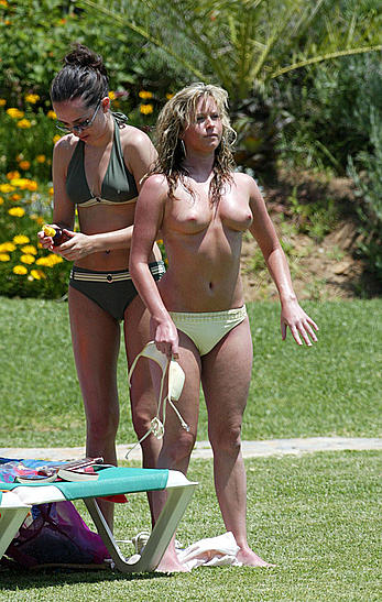 Brooke Kinsella sunbathing topless in Puerto Banus