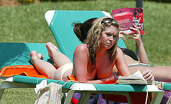 Brooke Kinsella sunbathing topless in Puerto Banus