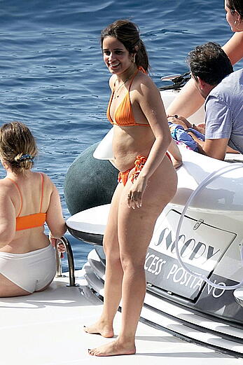 Camila Cabello shows her ass in orange bikini in Capri