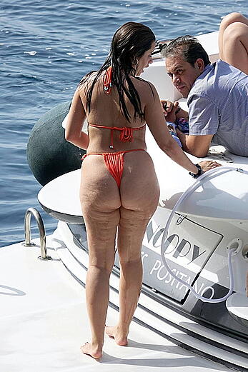 Camila Cabello shows her ass in orange bikini in Capri