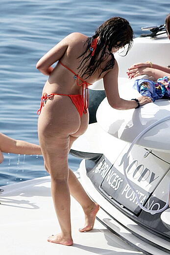 Camila Cabello shows her ass in orange bikini in Capri