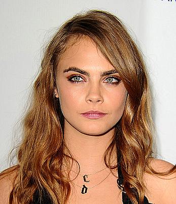 Cara Delevingne slight cleavage at Weinstein Company and Netflix 2015 Golden Globes After Party