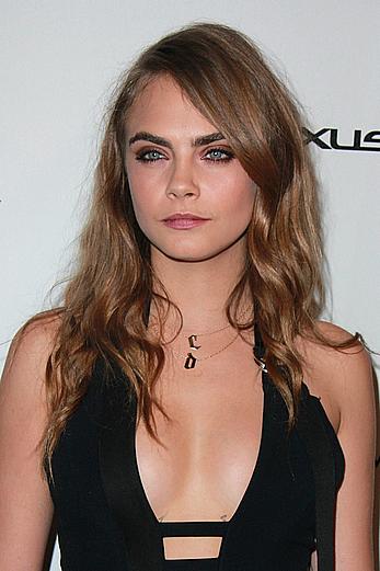 Cara Delevingne slight cleavage at Weinstein Company and Netflix 2015 Golden Globes After Party