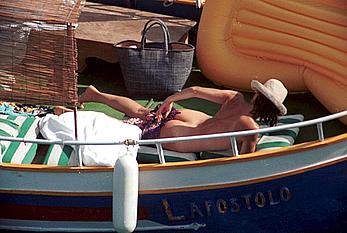 French Carole Bouquet topless on a yacht near St Tropez