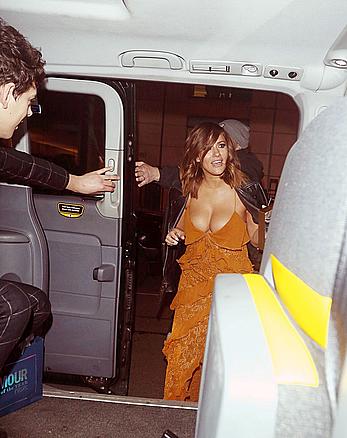 Caroline Flack nipple slip in a cab at Glamour Women Of The Year Awards in London