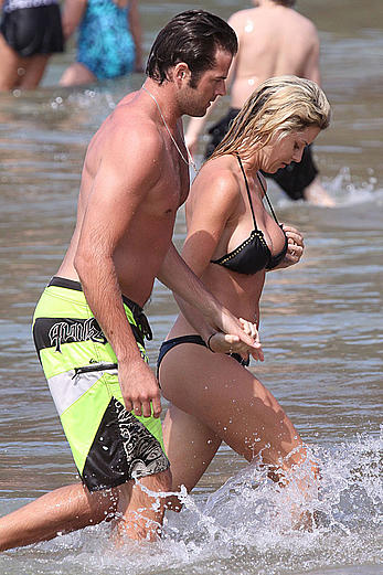 Carrie Prejean nipple slip in Hawaii paparazzi photos