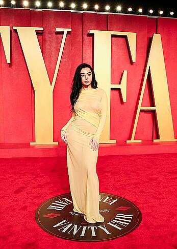 Charli XCX braless in see through dress at Vanity Fair Oscar Party in Beverly Hills