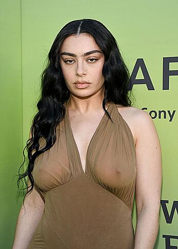 Charli XCX braless in see through dress at Variety's Hitmakers brunch