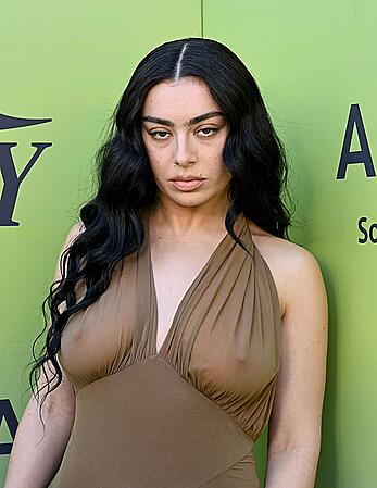 Charli XCX braless in see through dress at Variety's Hitmakers brunch