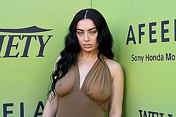 Charli XCX braless in see through dress at Variety's Hitmakers brunch