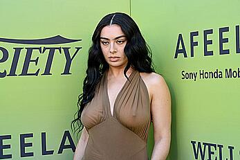 Charli XCX braless in see through dress at Variety's Hitmakers brunch