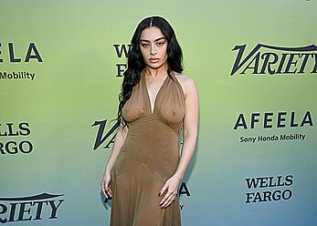 Charli XCX braless in see through dress at Variety's Hitmakers brunch