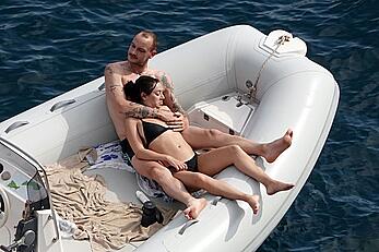 Charli XCX topless on a boat in vacation on the Amalfi Coast