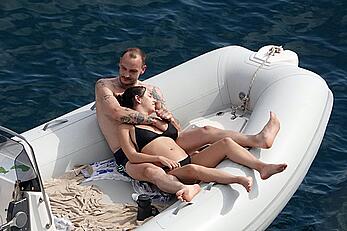 Charli XCX topless on a boat in vacation on the Amalfi Coast