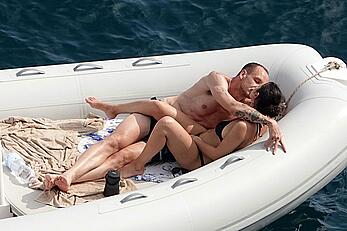 Charli XCX topless on a boat in vacation on the Amalfi Coast