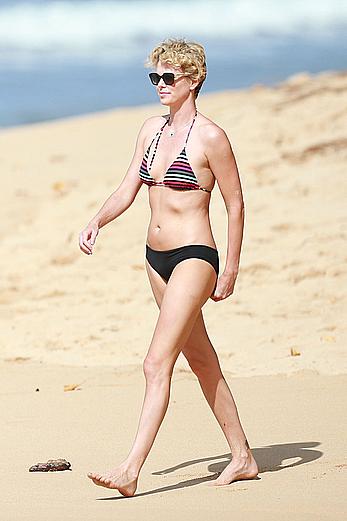 Charlize Theron sexy in bikini on a beach in Hawaii