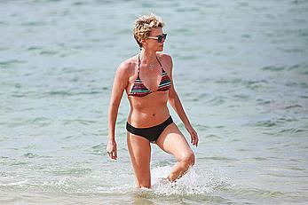 Charlize Theron sexy in bikini on a beach in Hawaii