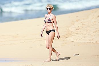 Charlize Theron sexy in bikini on a beach in Hawaii