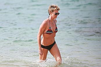 Charlize Theron sexy in bikini on a beach in Hawaii