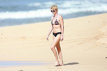 Charlize Theron sexy in bikini on a beach in Hawaii