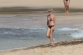 Charlize Theron sexy in bikini on a beach in Hawaii