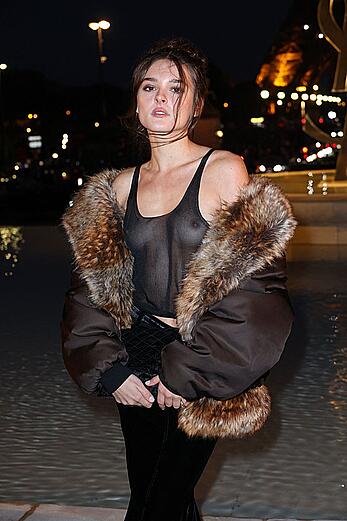 Charlotte Lawrence see through to tits at Saint Laurent show in Paris