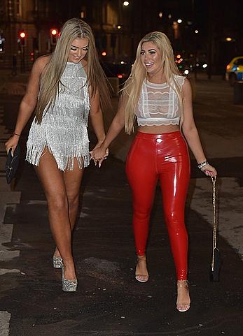 Chloe Ferry in see through top and red pants