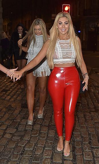 Chloe Ferry in see through top and red pants