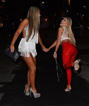 Chloe Ferry in see through top and red pants