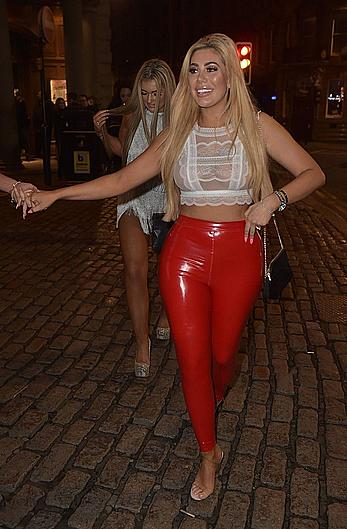 Chloe Ferry in see through top and red pants