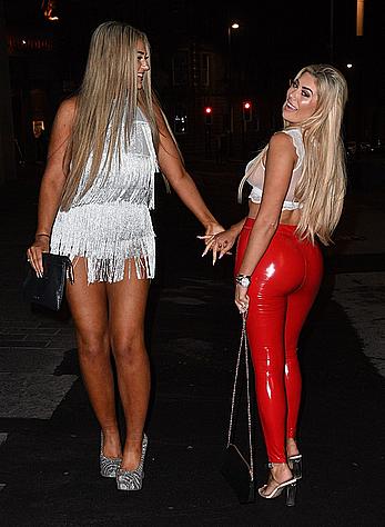 Chloe Ferry in see through top and red pants