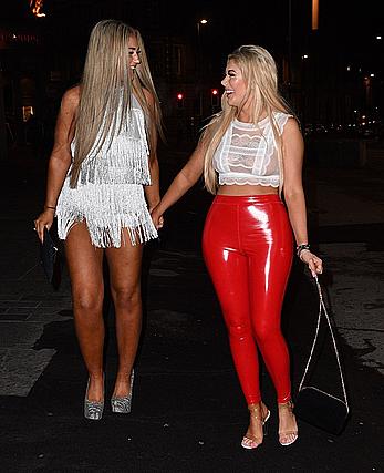 Chloe Ferry in see through top and red pants