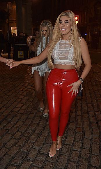 Chloe Ferry in see through top and red pants