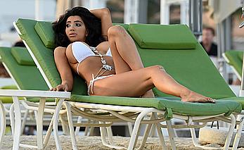 Busty Chloe Khan in white bikini candids in Dubai