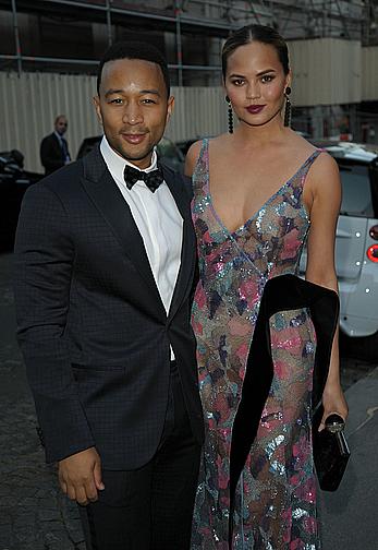 Chrissy Teigen hard nipples under see through dess at Vogue party