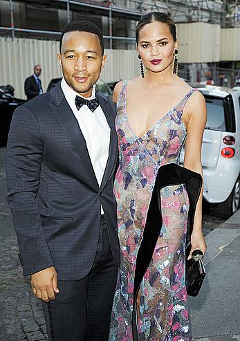 Chrissy Teigen hard nipples under see through dess at Vogue party