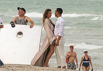 Chrissy Teigen topless during photoshoot at Miami Beach