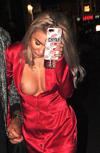 Drunk Chyna Ellis tit slip in short red dress in London