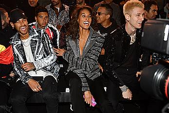 Cindy Bruna braless in metalic jacket at Balmain Homme show in Paris