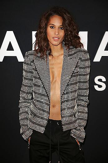 Cindy Bruna braless in metalic jacket at Balmain Homme show in Paris