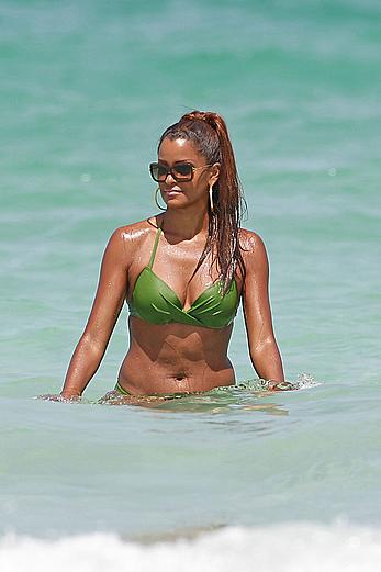 Claudia Jordan in green bikini at Miami beach