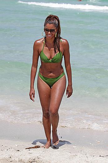 Claudia Jordan in green bikini at Miami beach