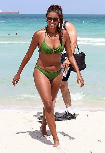 Claudia Jordan in green bikini at Miami beach