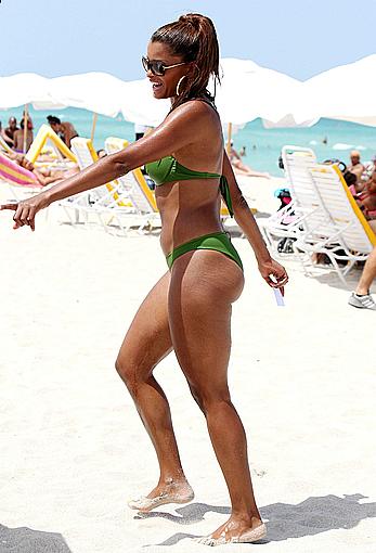 Claudia Jordan in green bikini at Miami beach