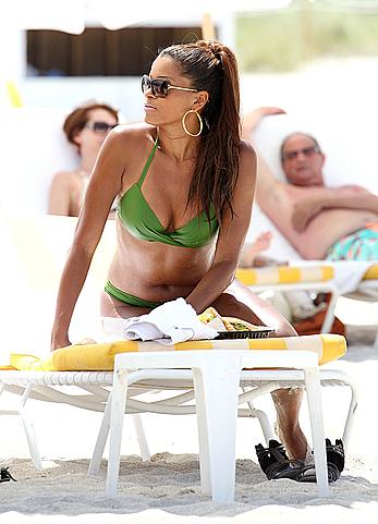 Claudia Jordan in green bikini at Miami beach