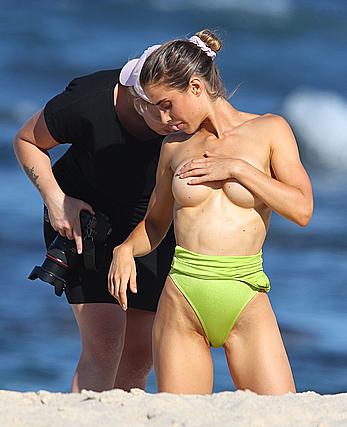 Claudia Jovanovski topless for a photoshoot on a beach in Sydney