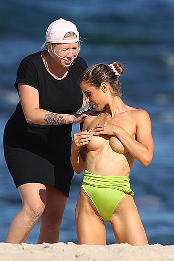 Claudia Jovanovski topless for a photoshoot on a beach in Sydney