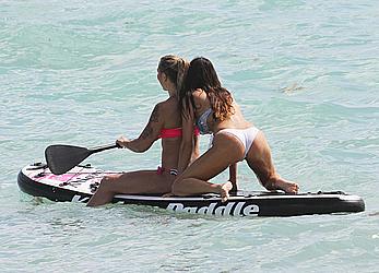 Claudia Romani cameltoe and cleavage in white bikini at the beach in Miami