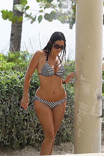 Claudia Romani taking a shower in a bikini in Miami